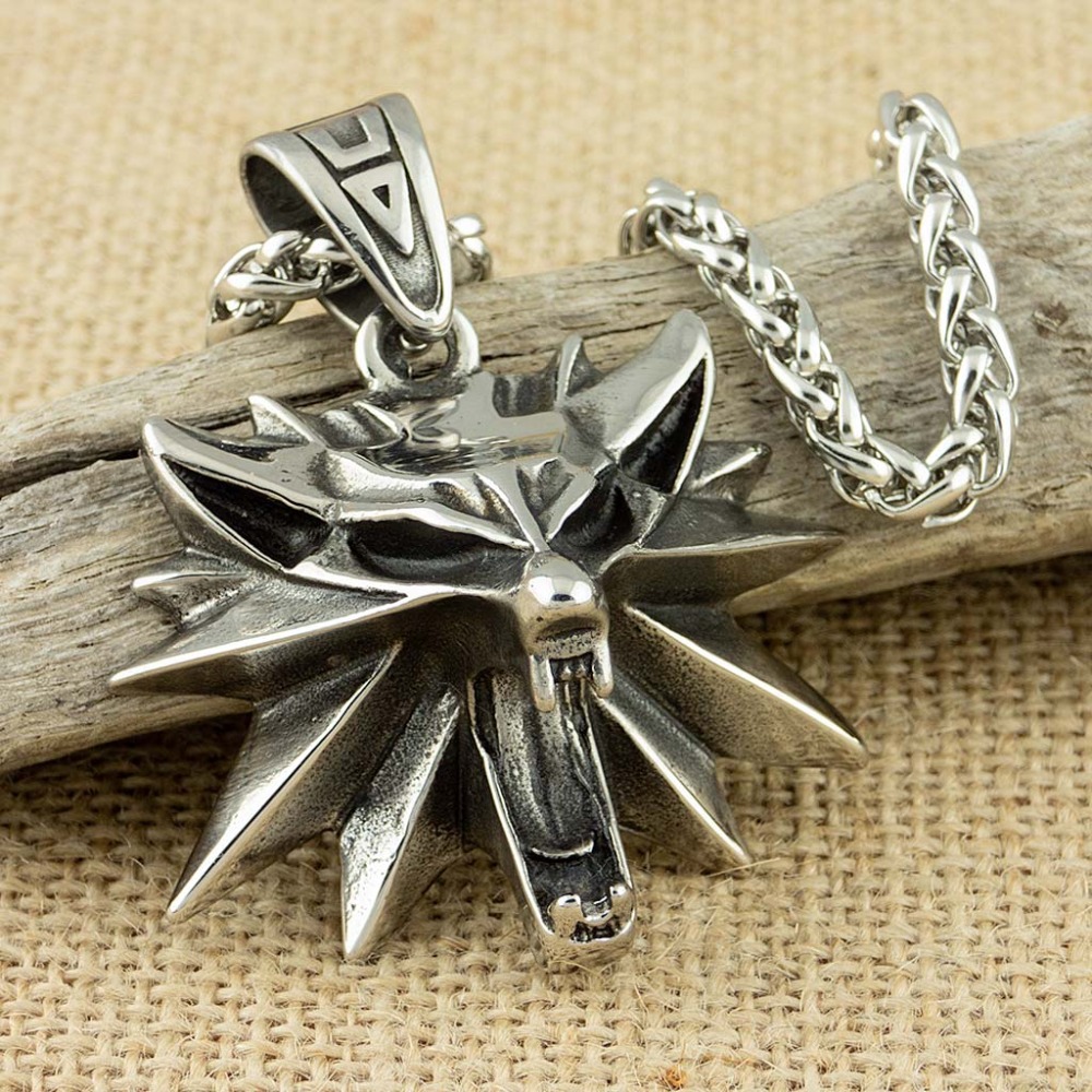 Wildman Hunting & Outdoor Price List - Collier avec pendentif tête de loup